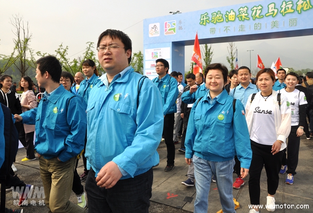 91麻豆国产福利品精電機（jī）員工參（cān）加健步走（zǒu）