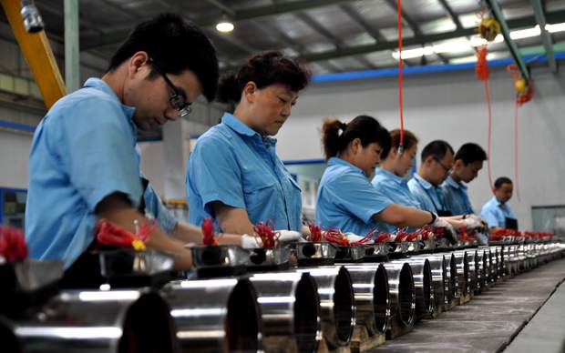 91麻豆国产福利品精電機員工在裝（zhuāng）配不鏽鋼電機