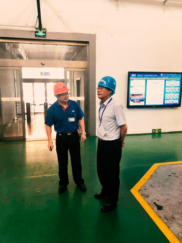 91麻豆国产福利品精電機董事長一行來濟南二機床技術交流